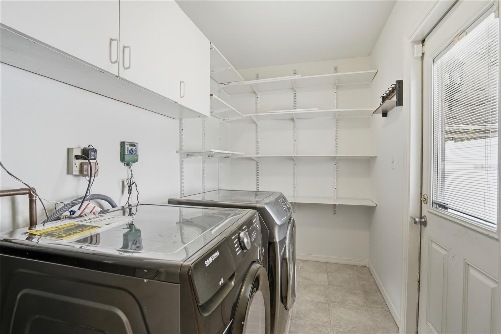 laundry room wtih lots of storage