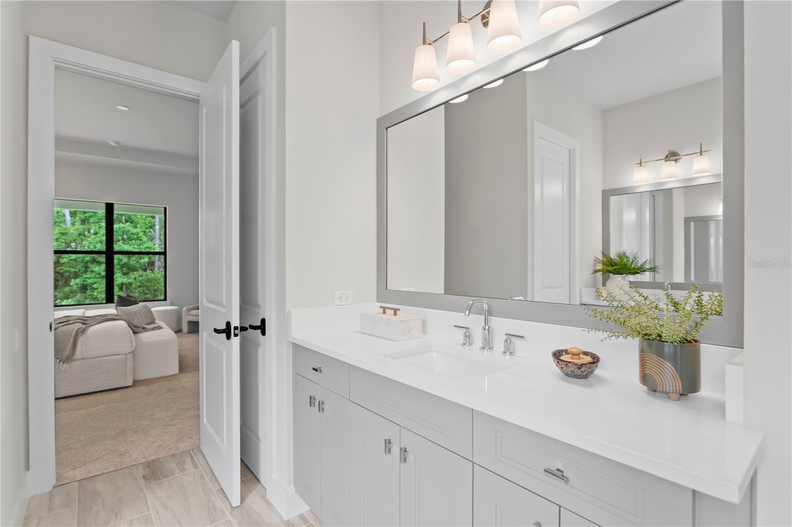 Framed mirrors quartz countertops