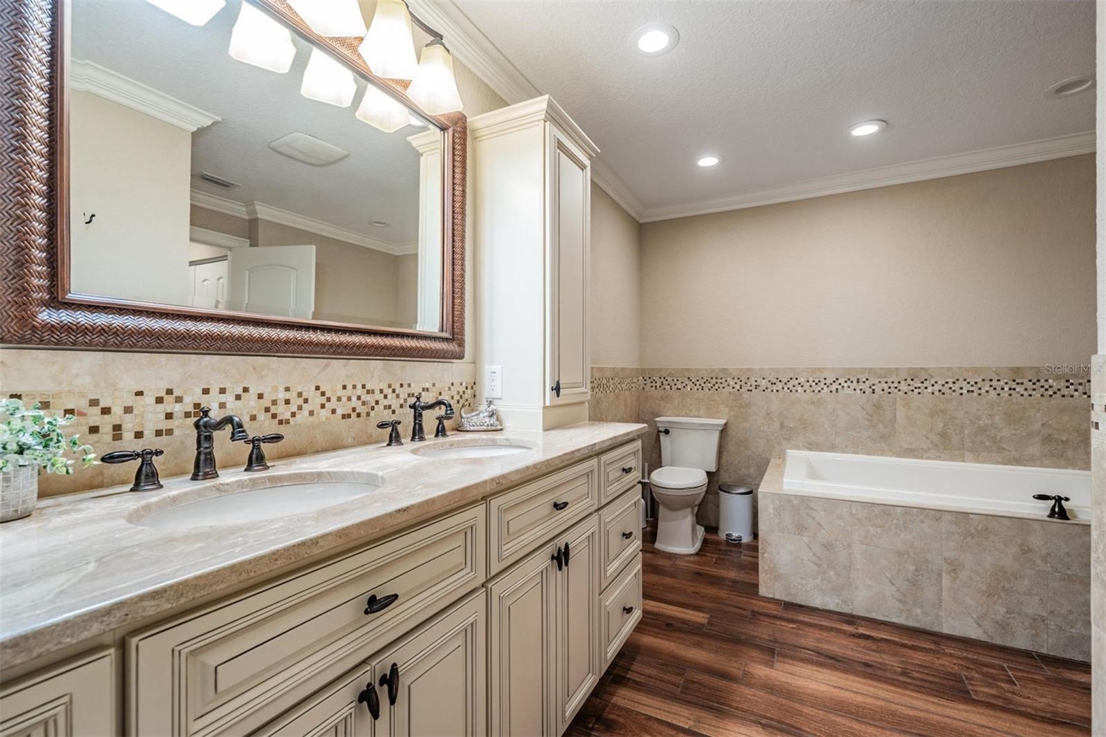 Primary Bathroom with Dual Vanities & Separate Shower & Soaking Tub