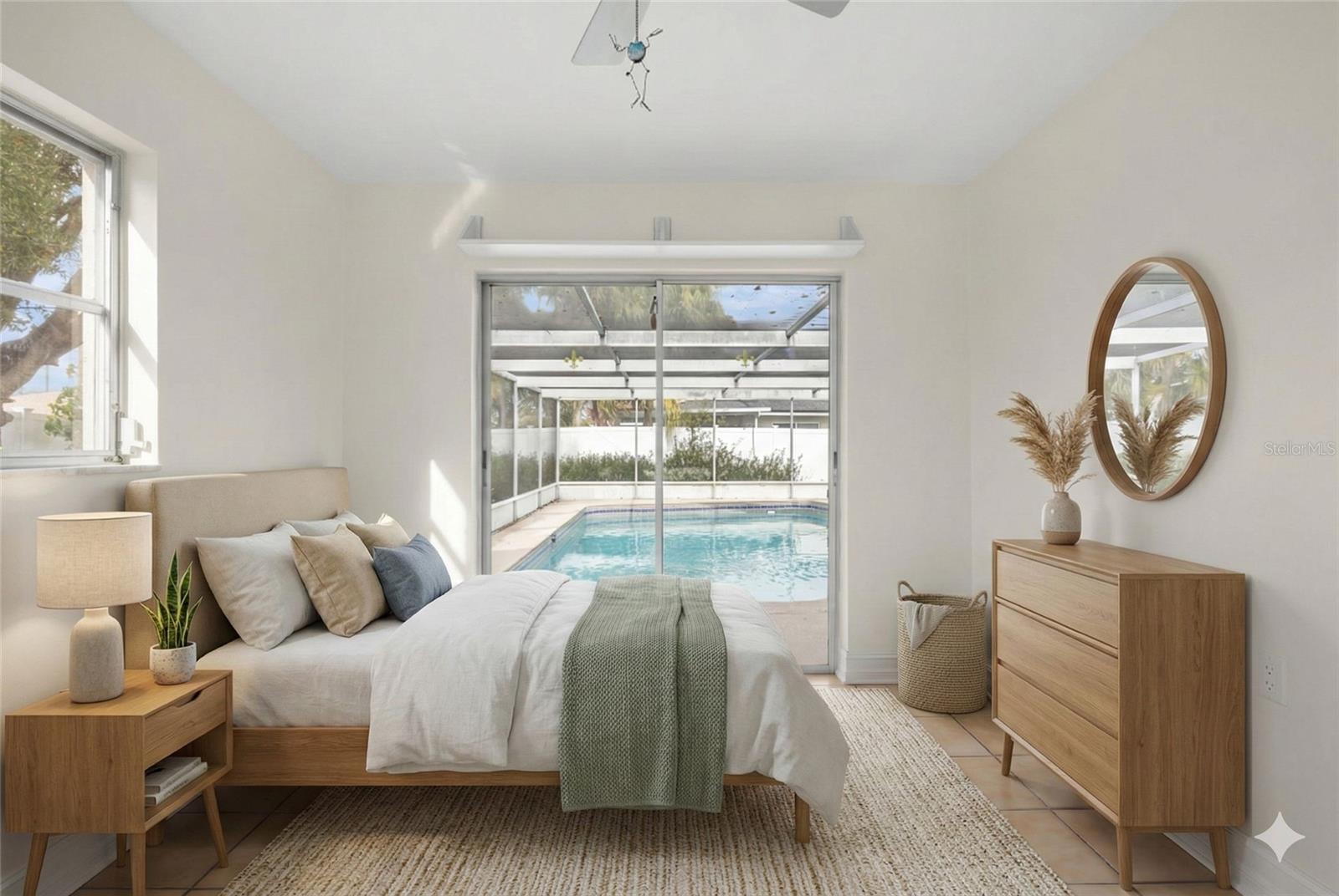 Bedroom #4 opens with slider onto the pool deck