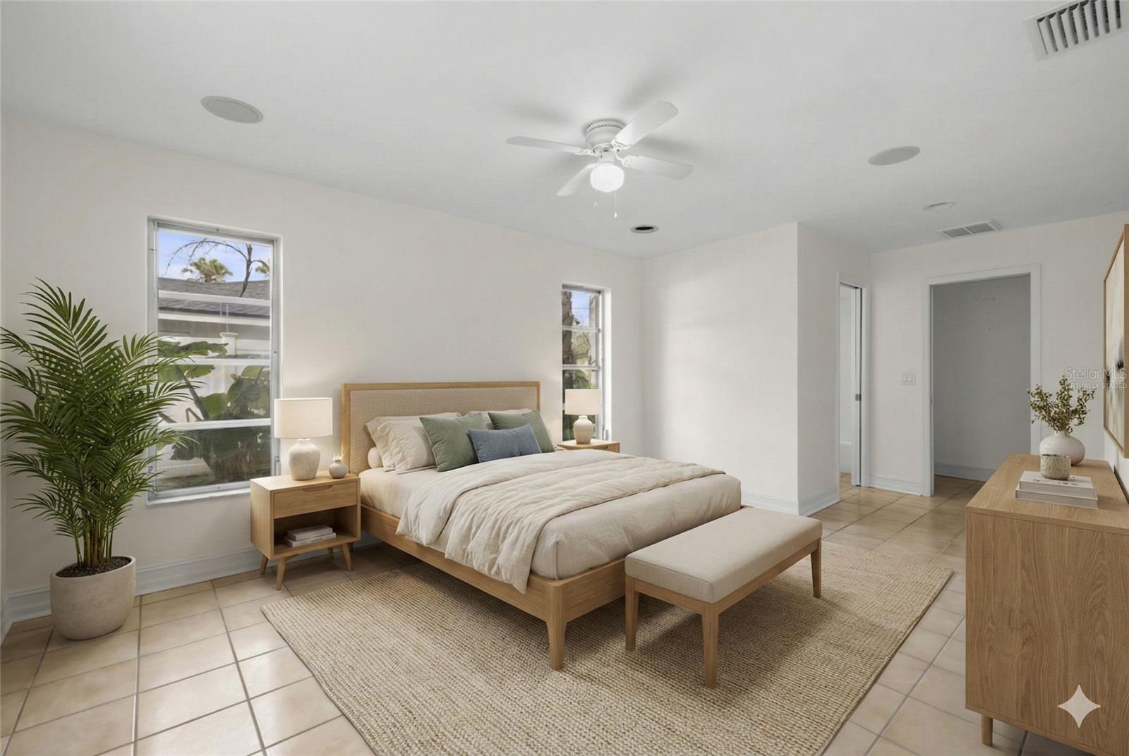 Virtually staged Primary Bedroom with En Suite Bathroom