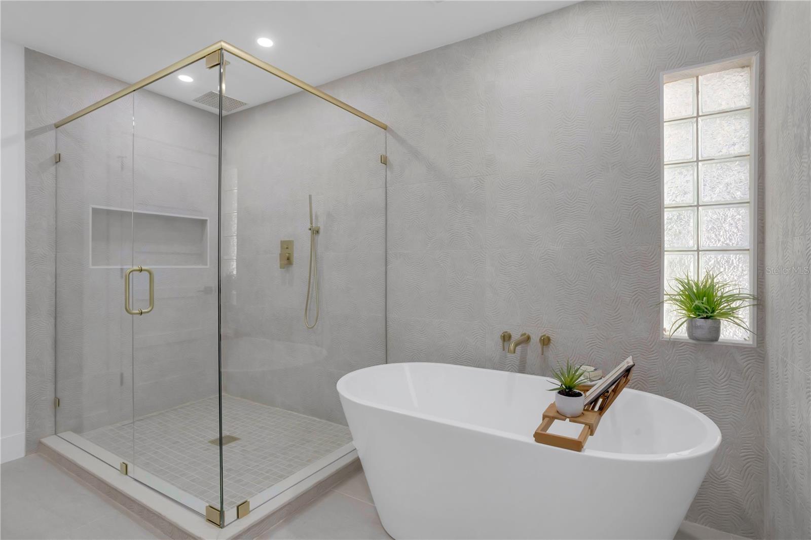 Primary Bathroom, dual vanity, separate soaking tub and shower