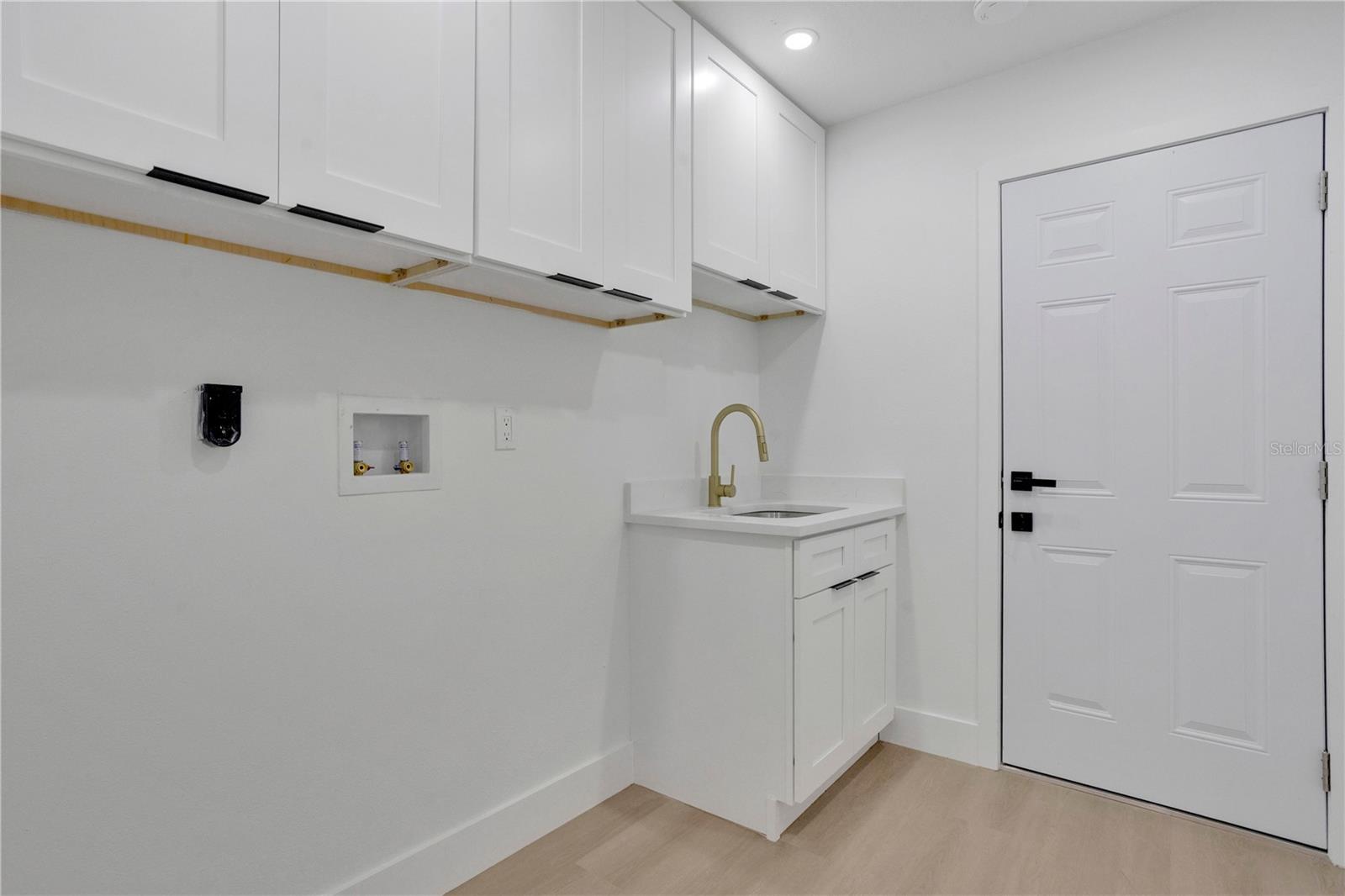 Inside laundry right off the garage