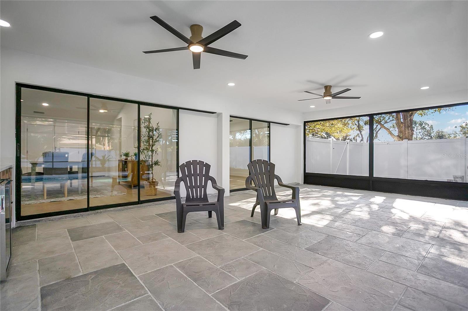 Expansive screened in Pool and patio, perfect for gatherings and enjoying indoor-outdoor living
