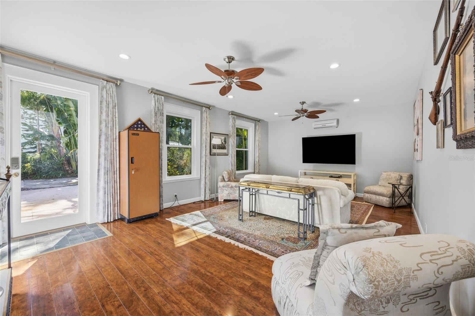 Media room with exit to rear of property