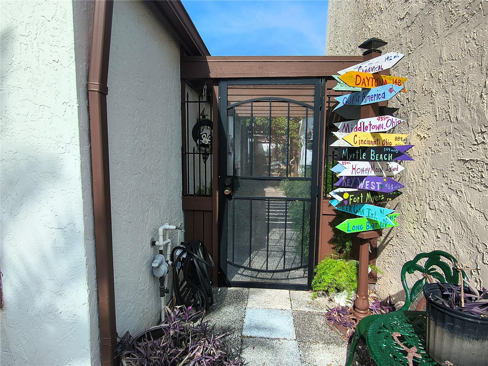 Gated entrance to Courtyard and double front doors
