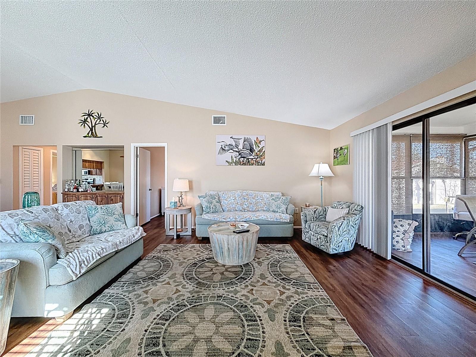 Living Area with Sliders to Enclosed Porch