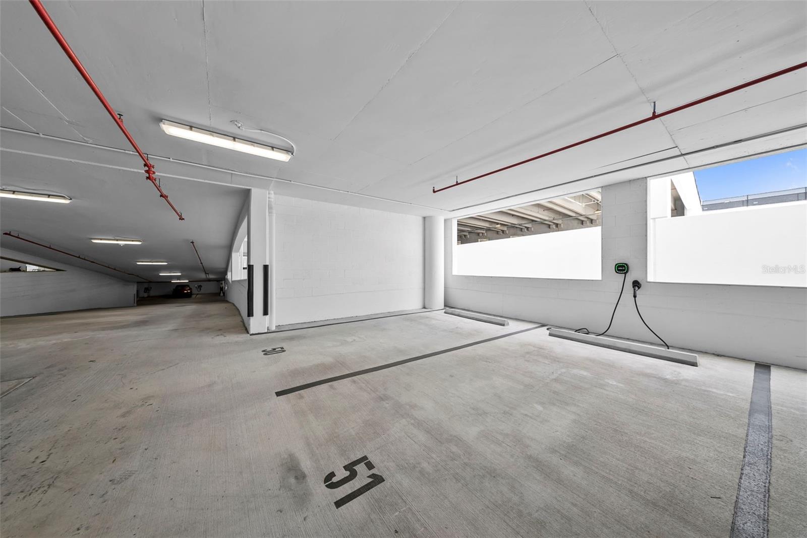 2 assigned parking spots with EV charger- 3rd floor