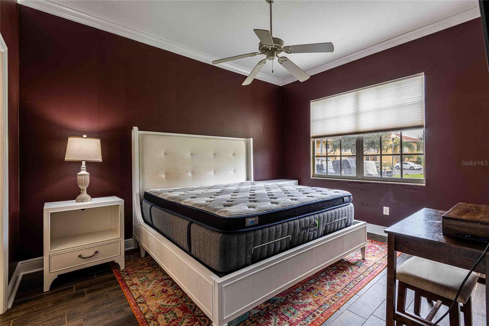 2 night stands, lamp bed frame, new King mattress and small desk.