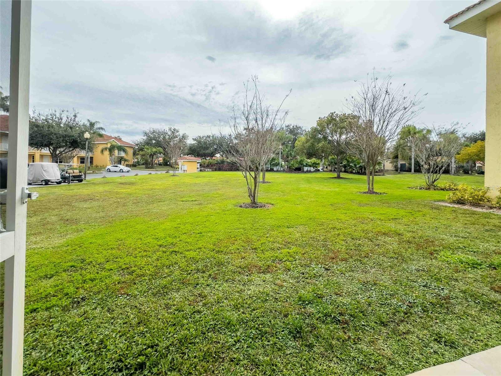 Step out the lanai and walk to the community mailbox in far back small yellow structure.