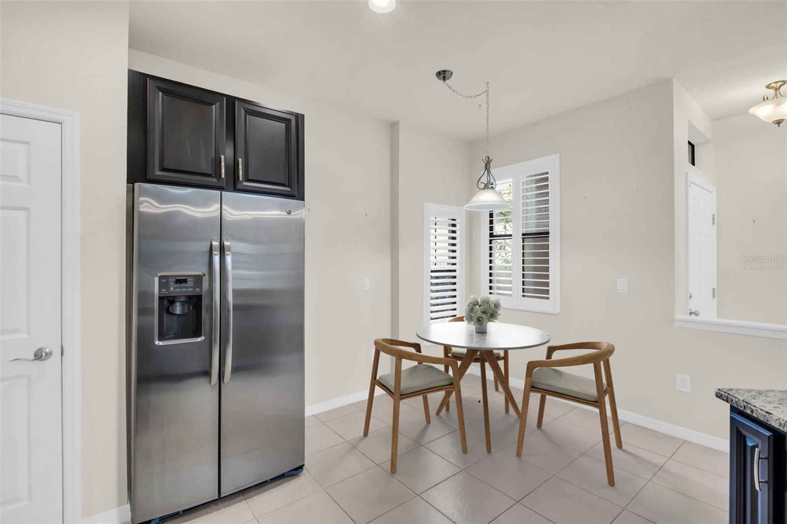 Spacious pantry closet & abundant cabinets for storage~ VIRTUALLY STAGED