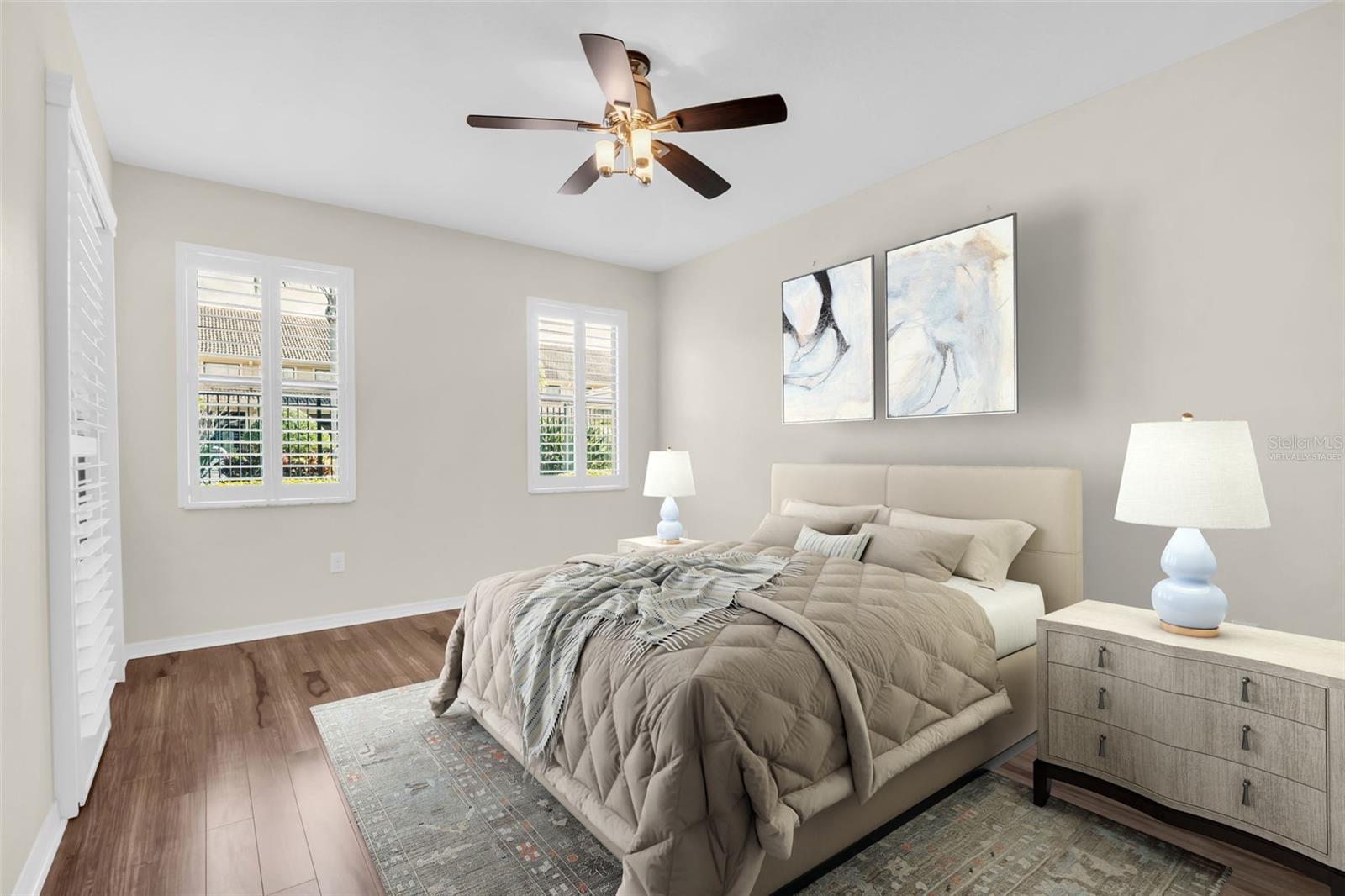 Primary oasis with pool views & slider access to the screened lanai~ VIRTUALLY STAGED