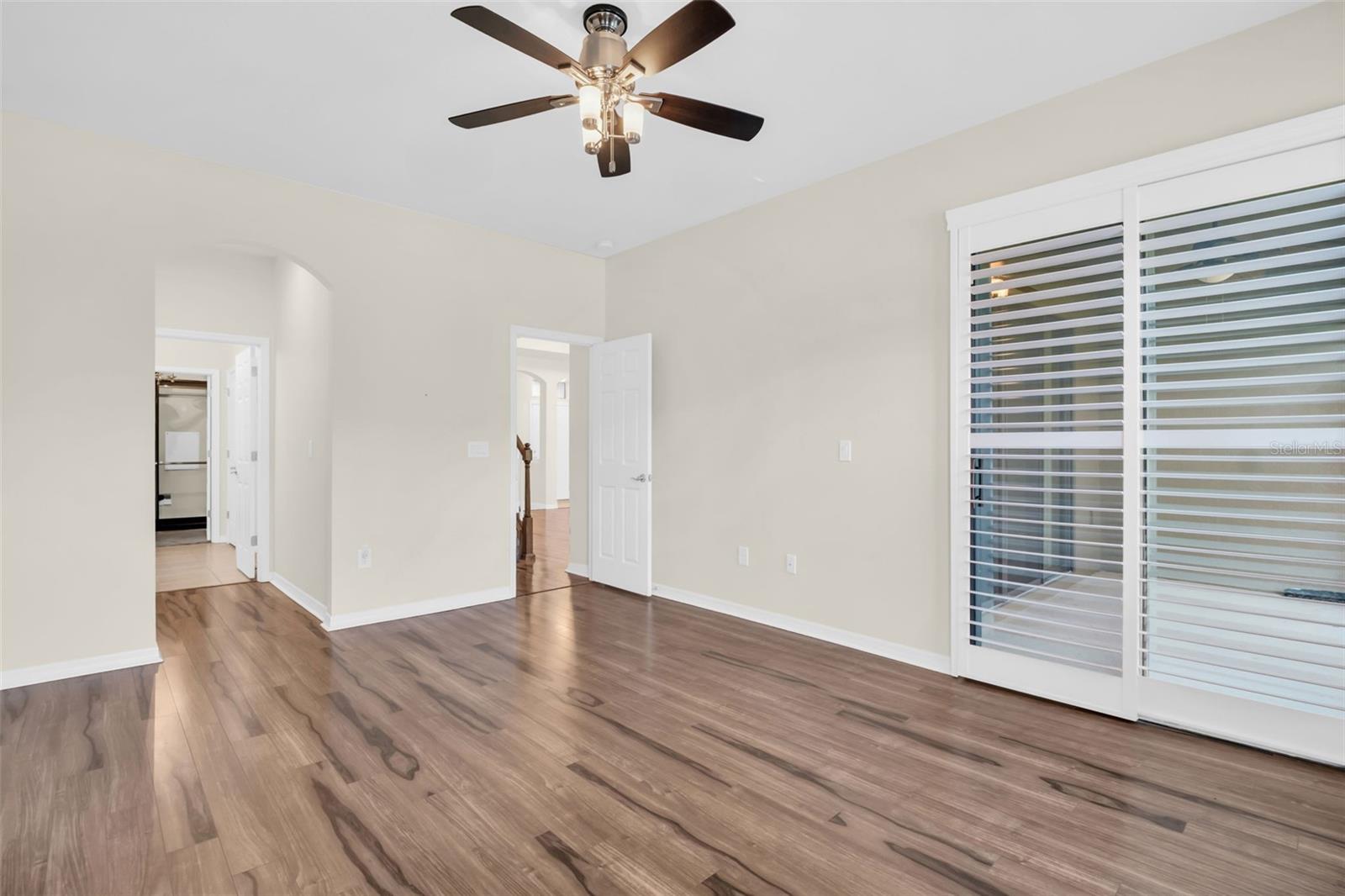 Updated primary en-suite bath, large built-in closet AND a walk-in closet with custom cabinetry~