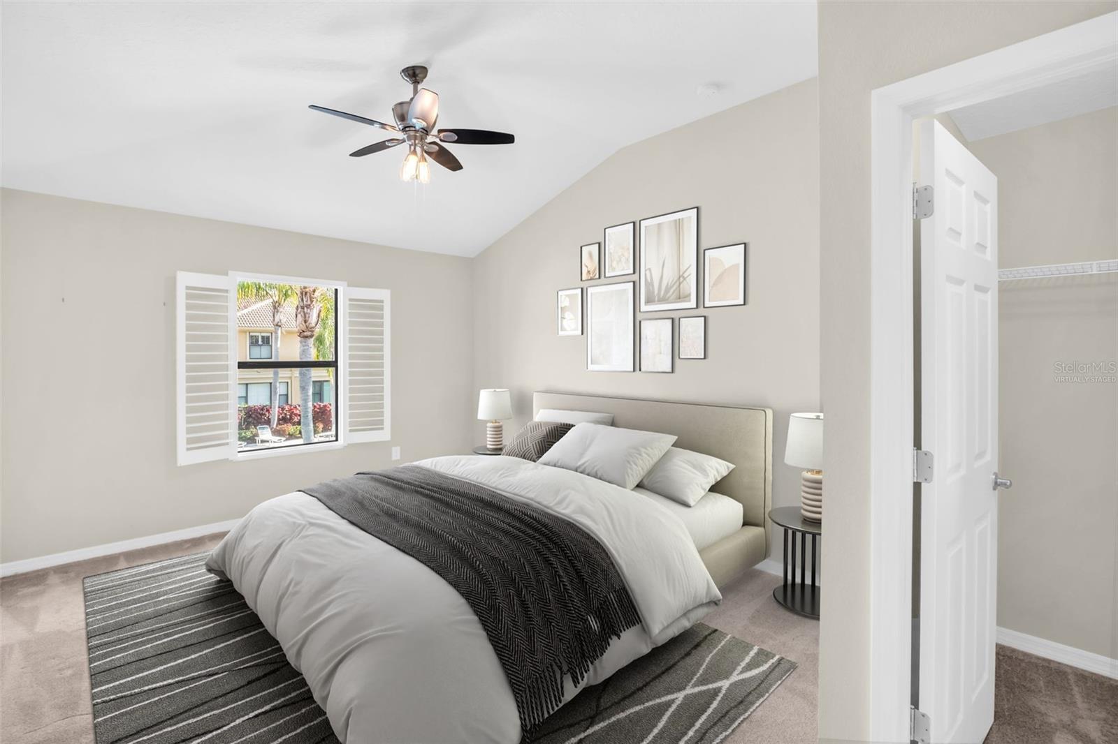 Large 2nd bedroom with walk-in closet and beautiful pool views~ VIRTUALLY STAGED