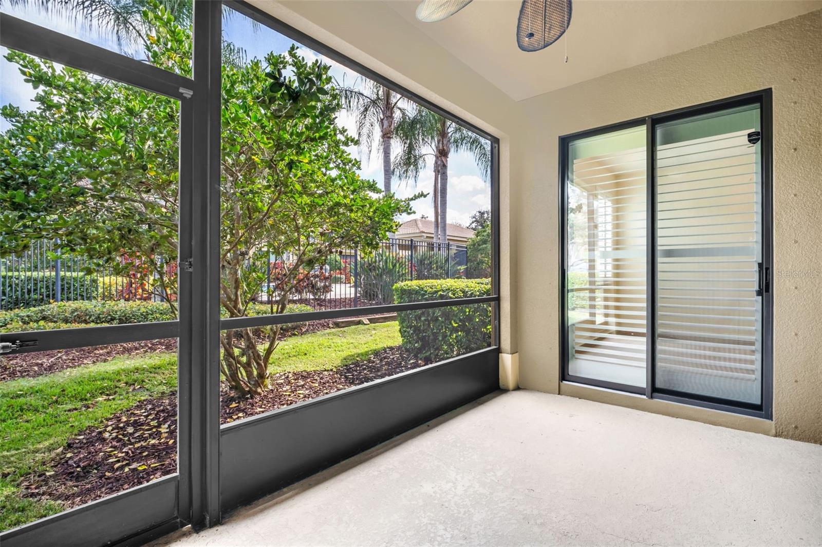 Peaceful screened lanai with pristine pool views~
