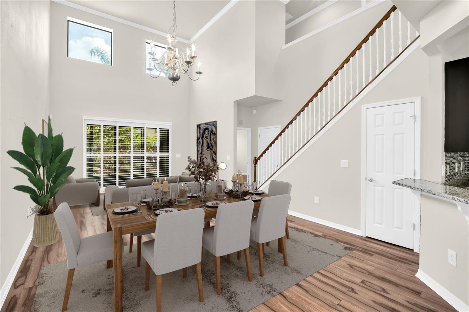 Spacious living/dining room combo making entertaining a breeze~ VIRTUALLY STAGED