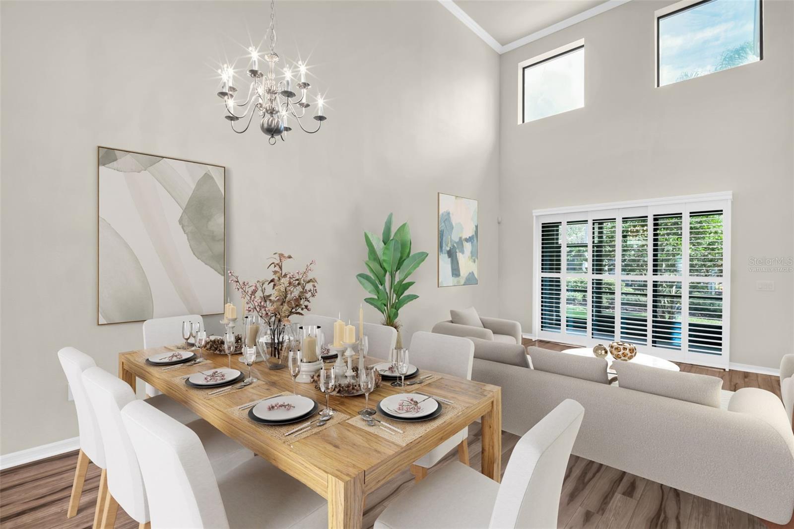 Natural light floods the space~ VIRTUALLY STAGED