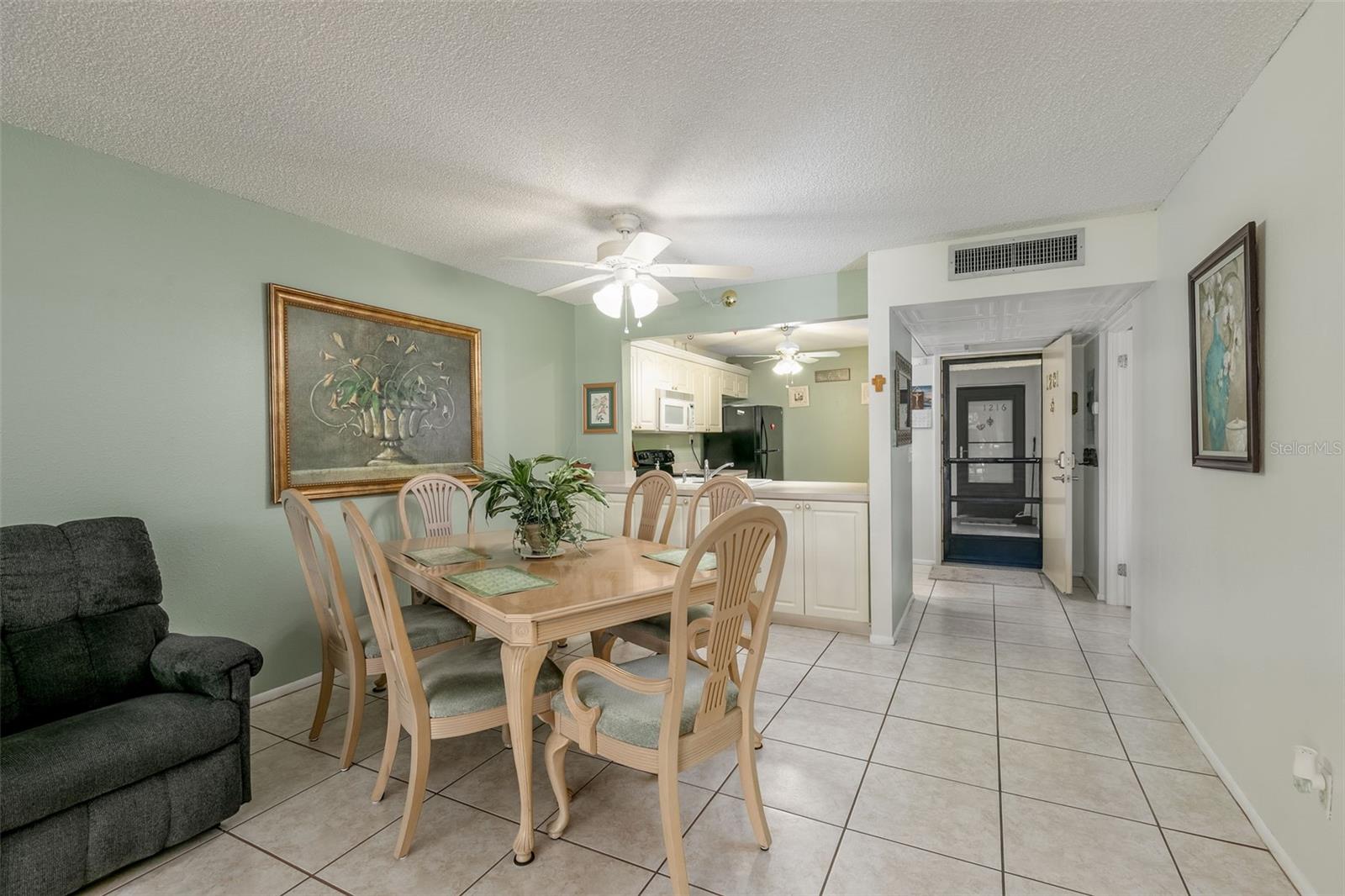 Dining Room into Kitchen and Front Door