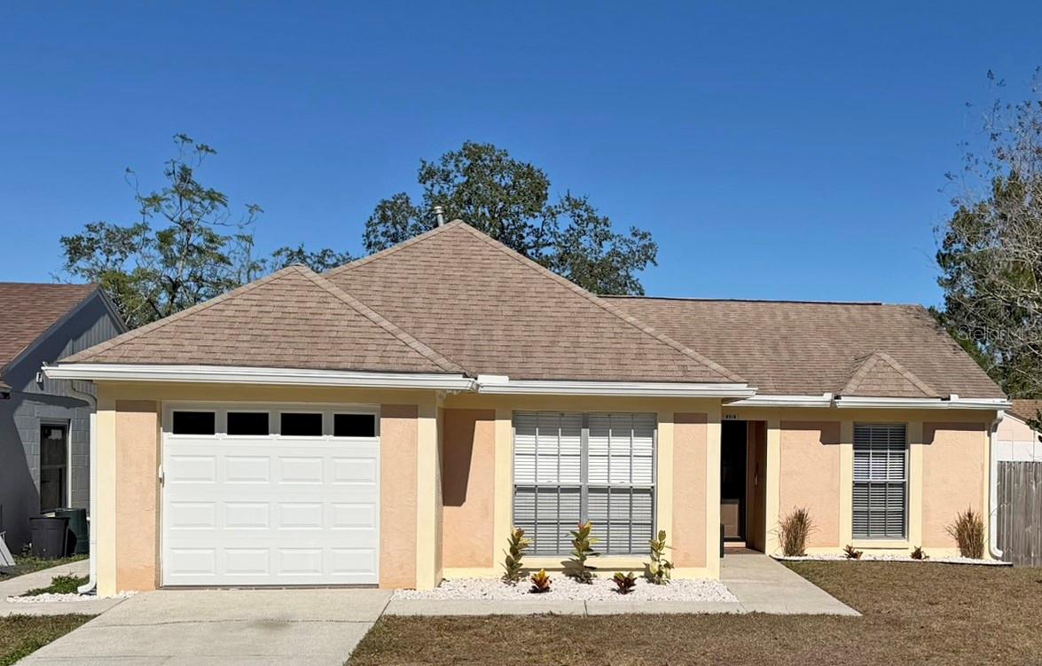 Front With New Garage Door