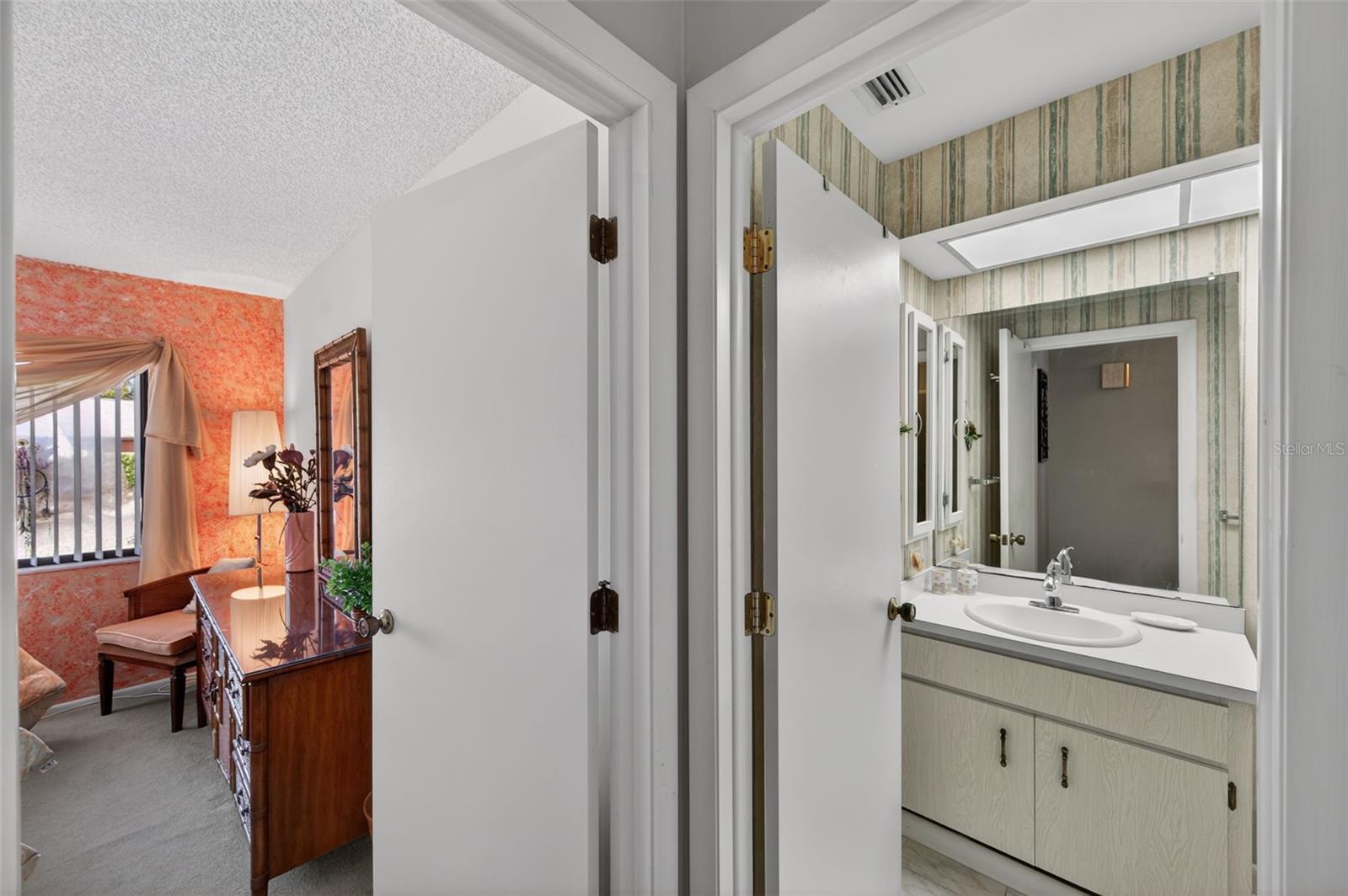 Guest bathroom adjacent to guest bedroom