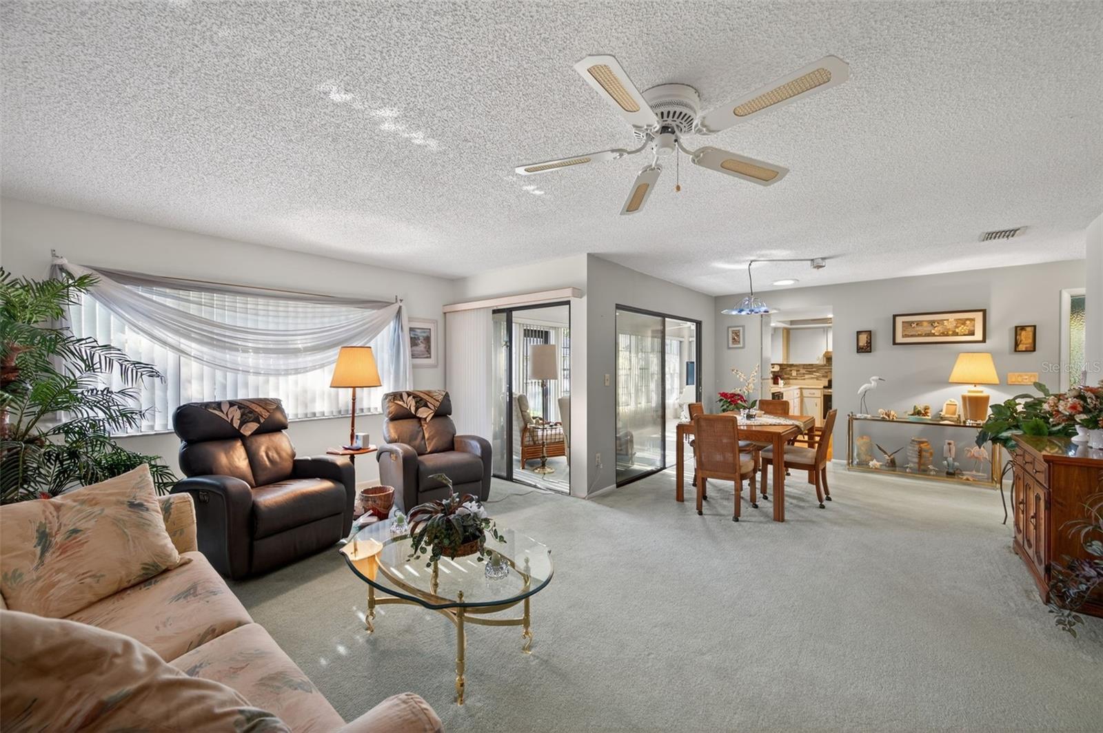 Living room overlooks dinging room. Great for entertaining