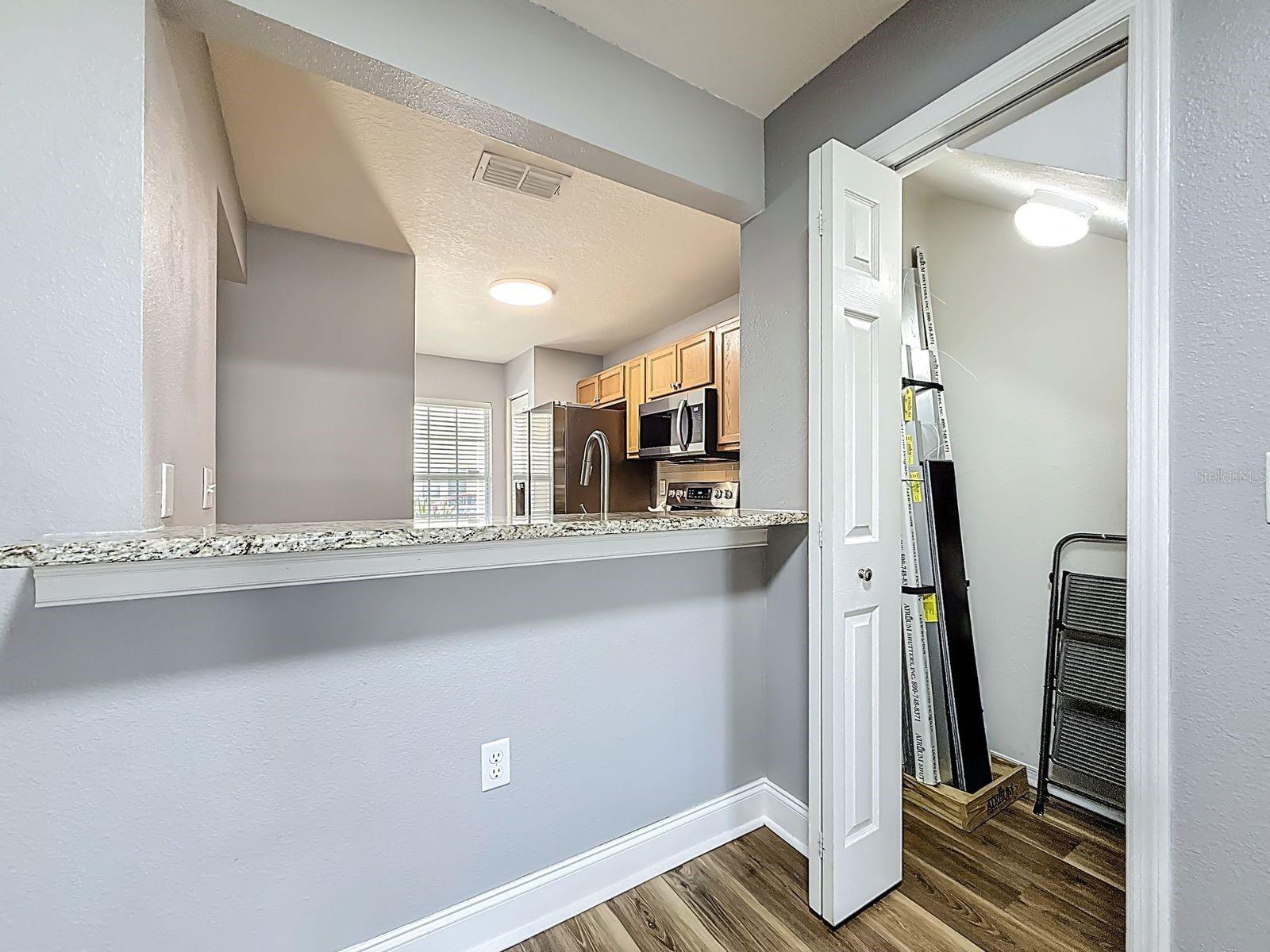 Breakfast bar and large storage underneath stairs