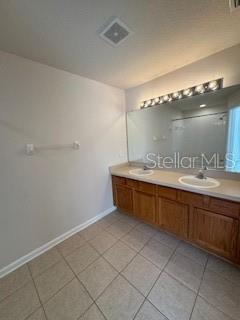 Master bath with dual sinks.
