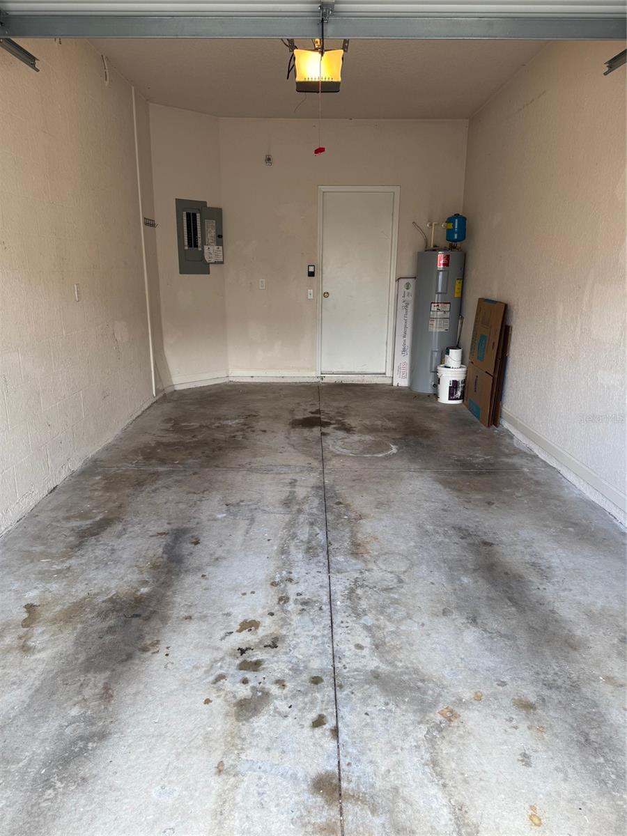 One car garage with opener.