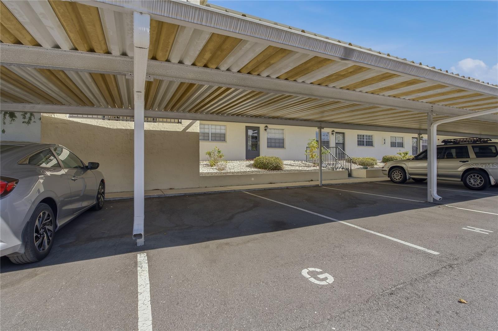 Carport with Assigned Parking Space