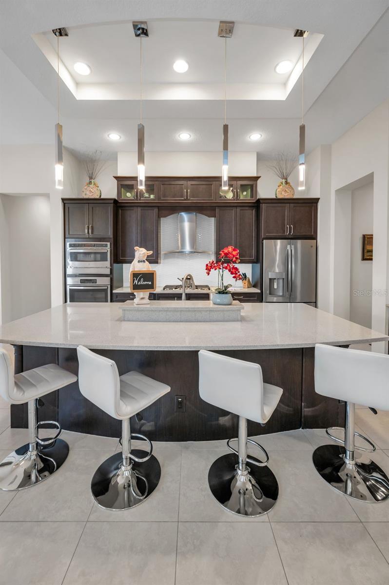 Expansive island seats at least four