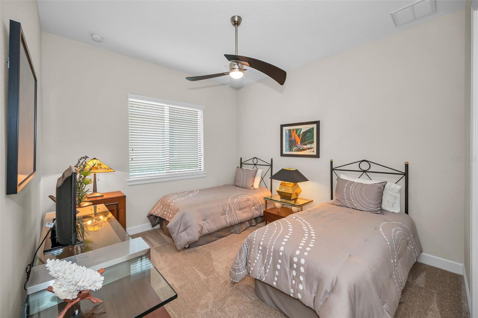 Second guest bedroom has walk-in closet