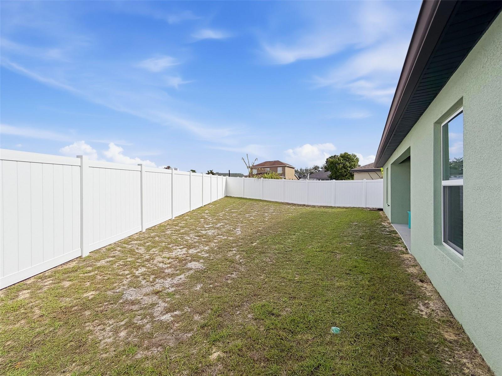 FENCED IN BACKYARD