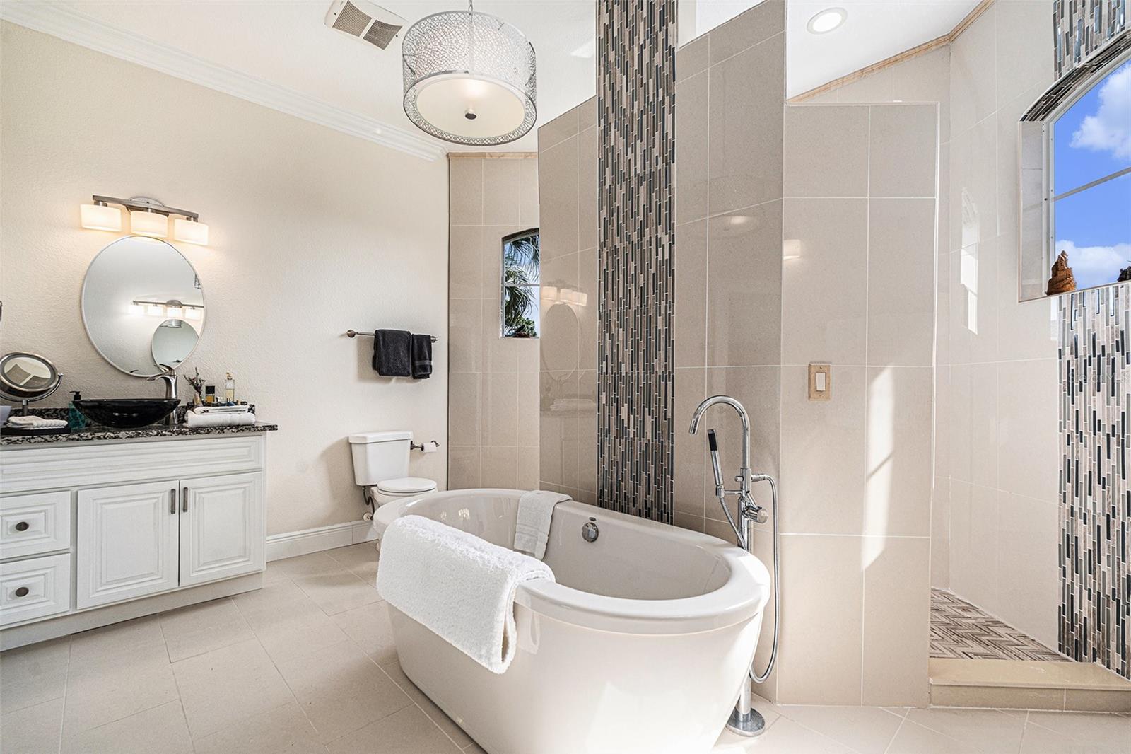 amazing master bath with dual vanities and massive shower.