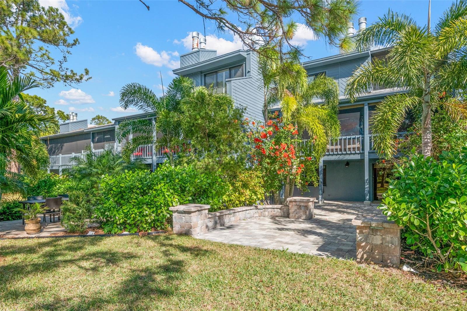 Beautiful extended brick paved patio off first floor