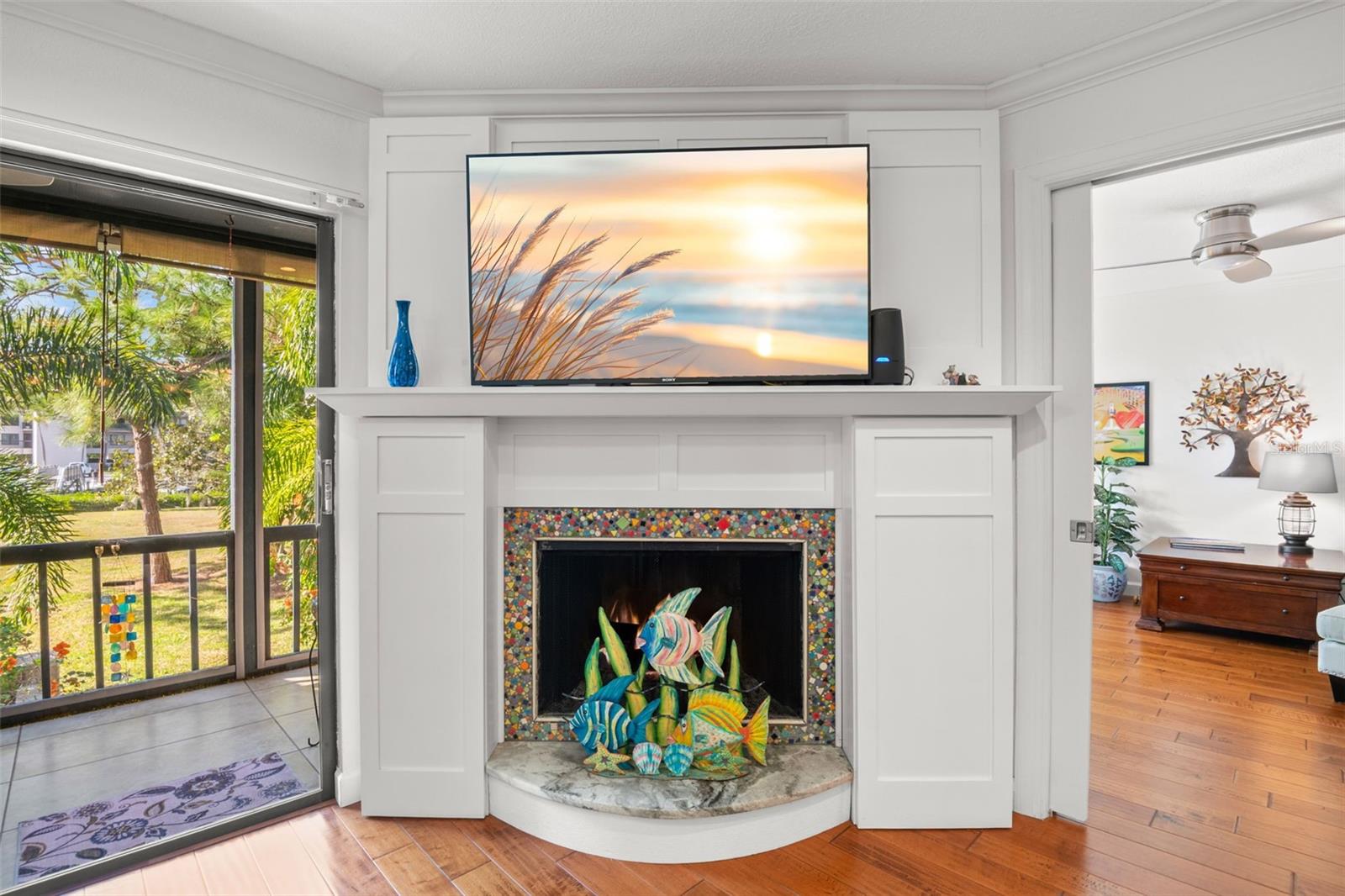 Beautiful corner wood burning fireplace in living room