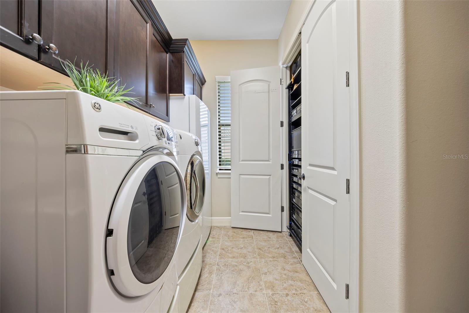 Control 4 main panel housed in laundry closet