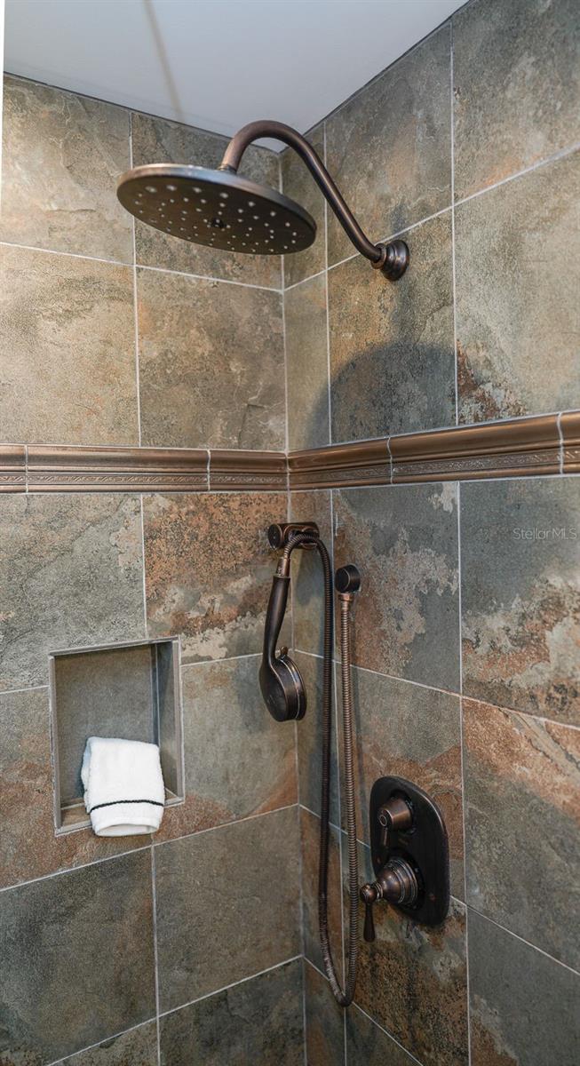 Primary Bedroom with en-suite bathroom and walk in closet