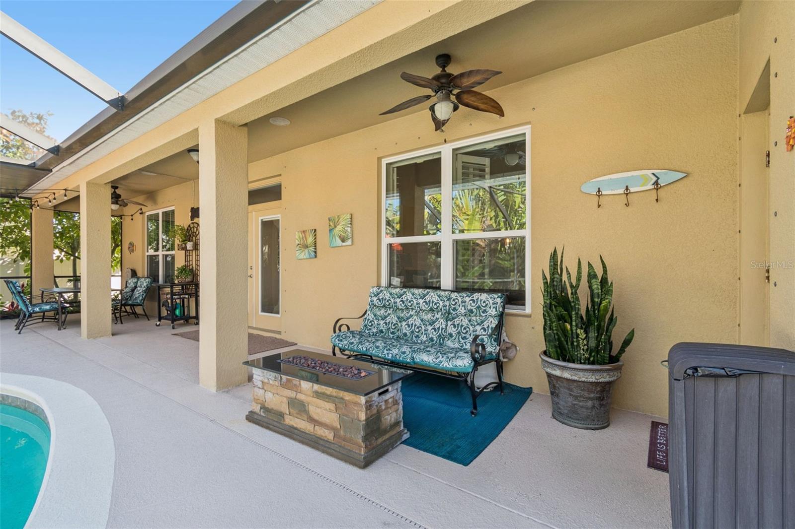 Additional covered seating area in the outdoor oasis
