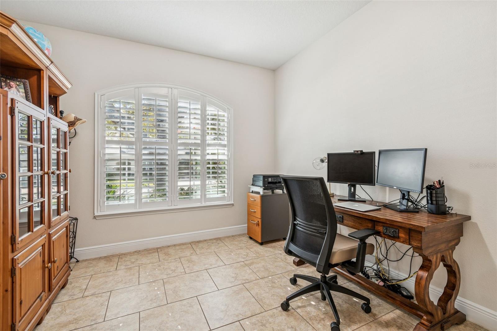 Ample dedicated office space in the font of the home away from all other activity