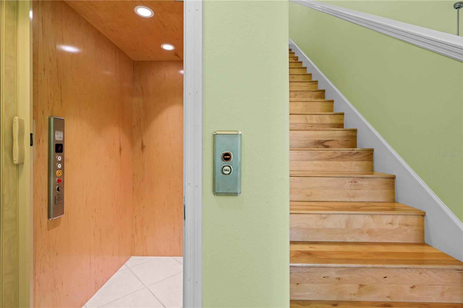 Elevator and stairs on first floor to second floor