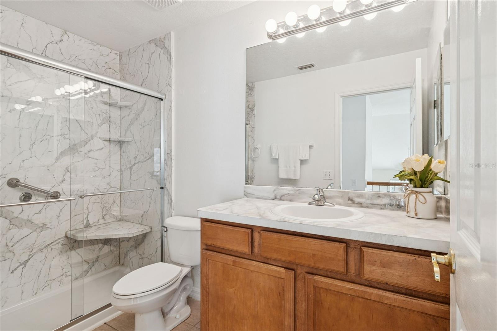 Full bath upstairs for both bedrooms and loft