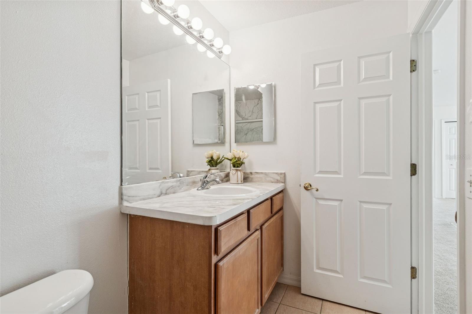 Full bath upstairs for both bedrooms and loft