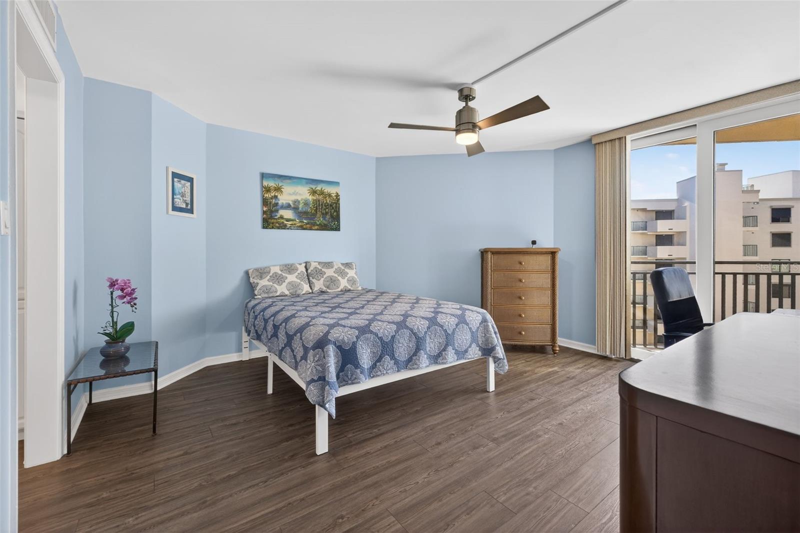 Bedroom is spacious with Slider leading to the Balcony