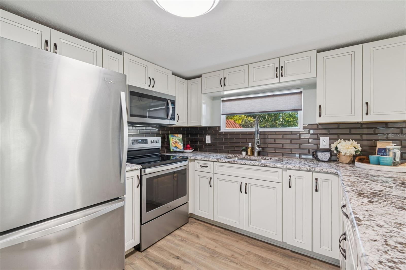 LED light fixture and custom window shade.