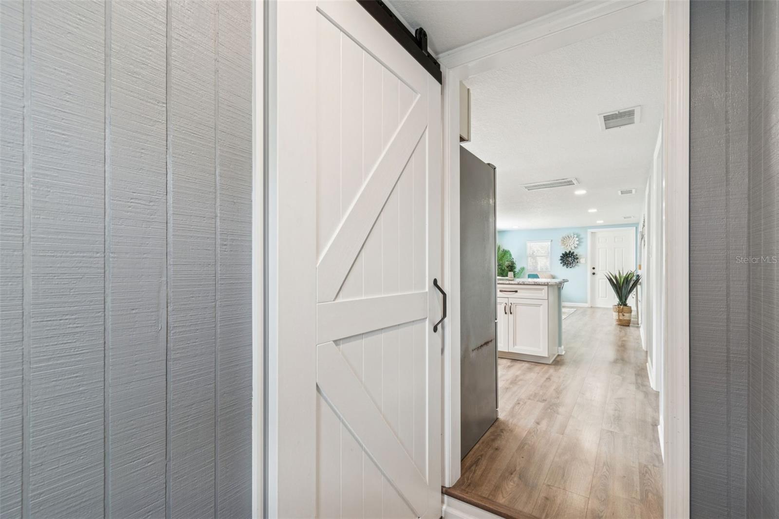 Soft open/close, sliding barn door.