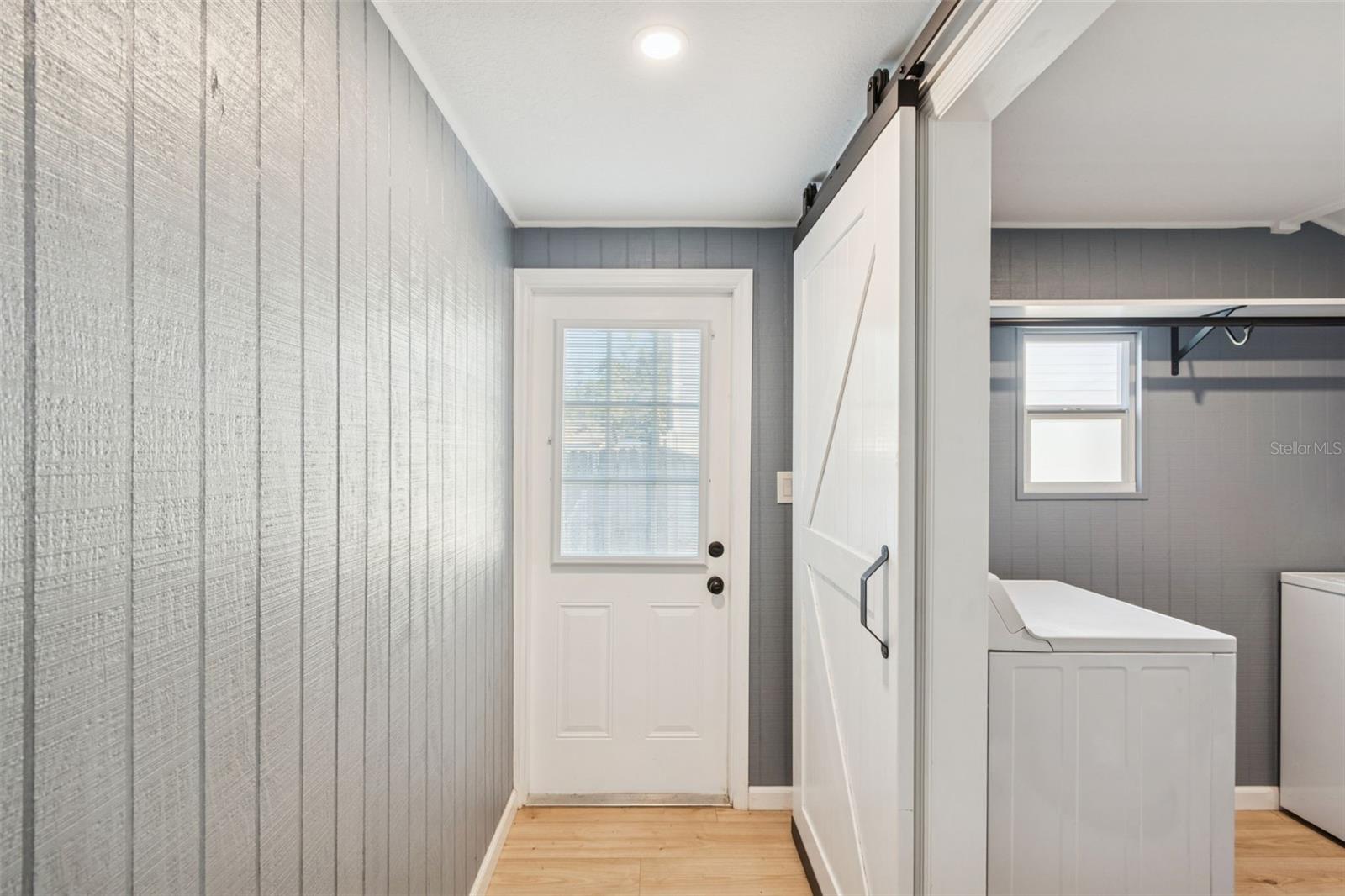 Soft open/close, sliding barn door.