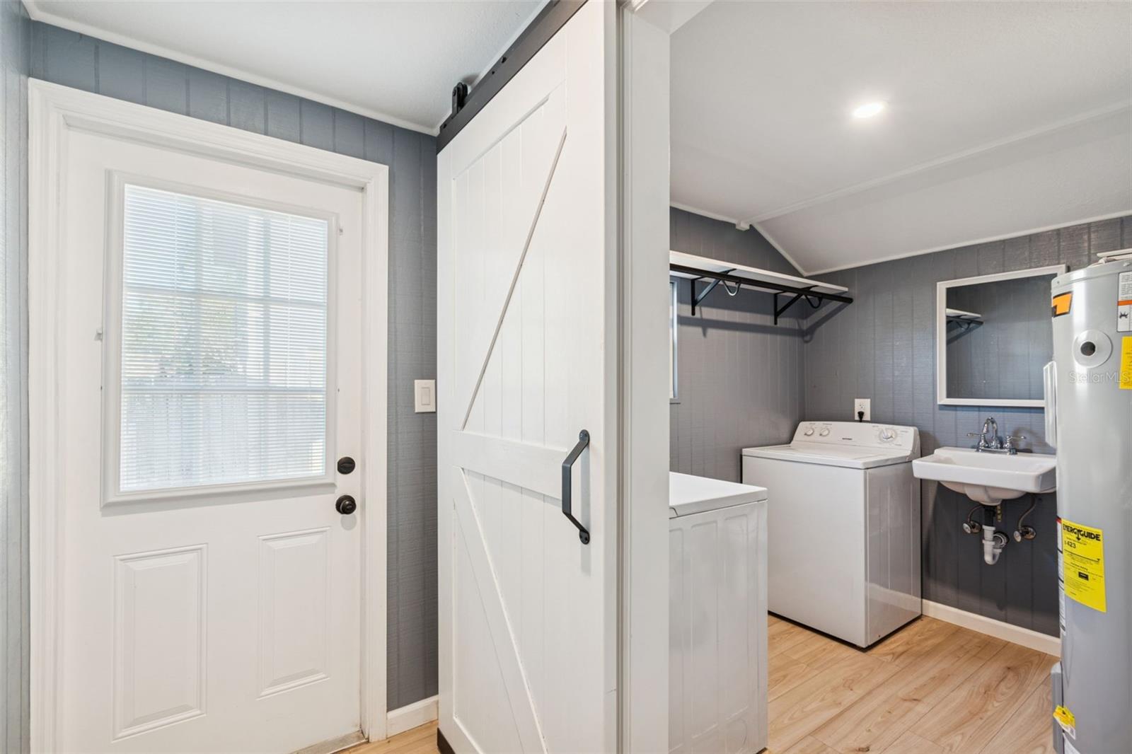 Laundry room plus half bath.
