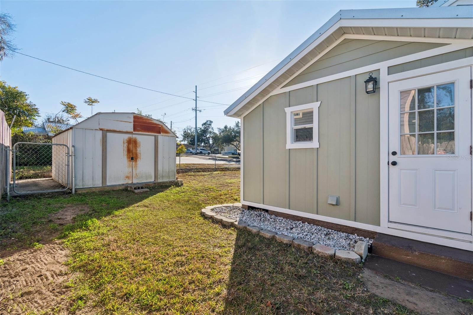 Storage shed on a concrete slab.