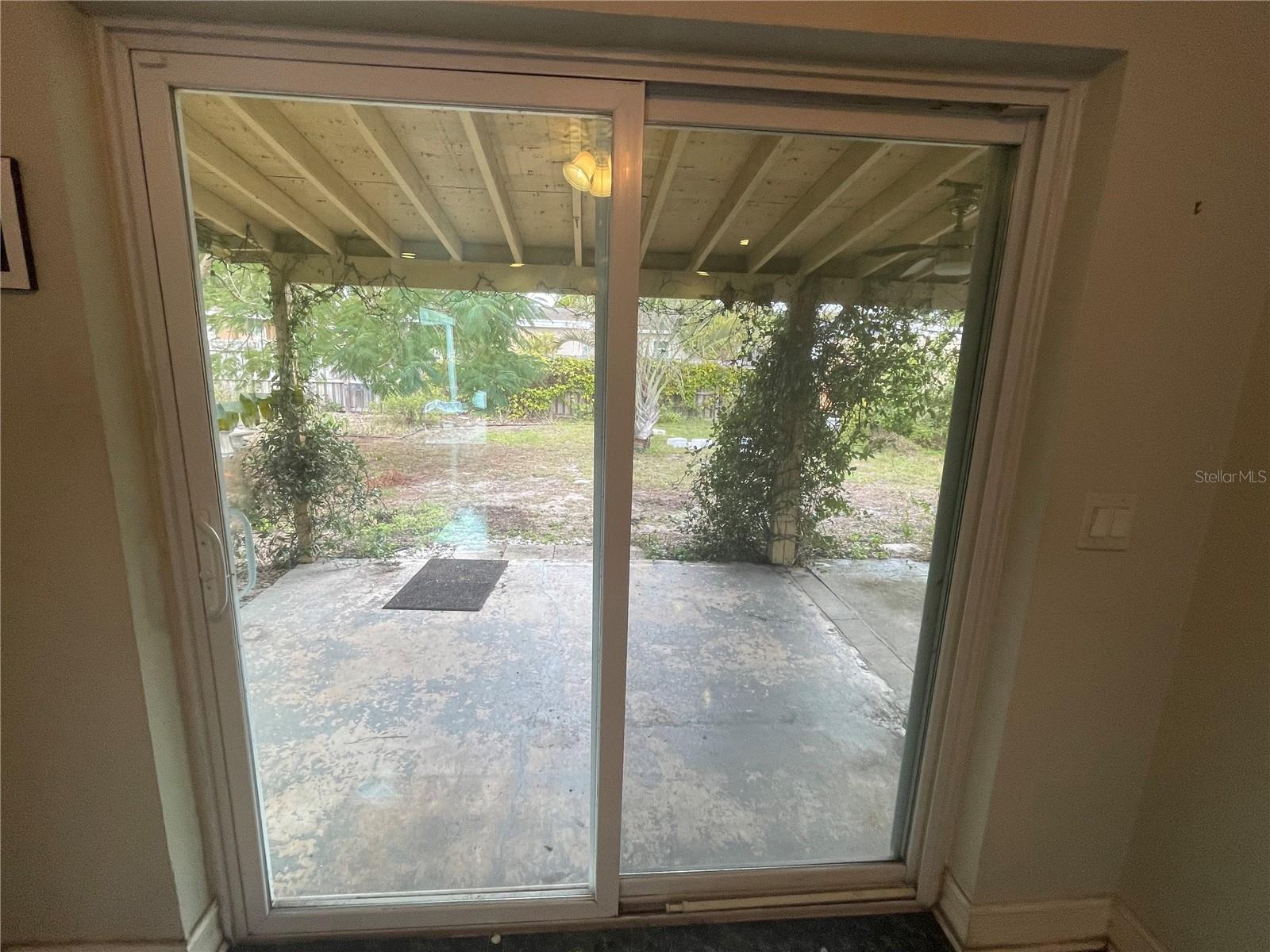 Sliders to Spacious Back Yard