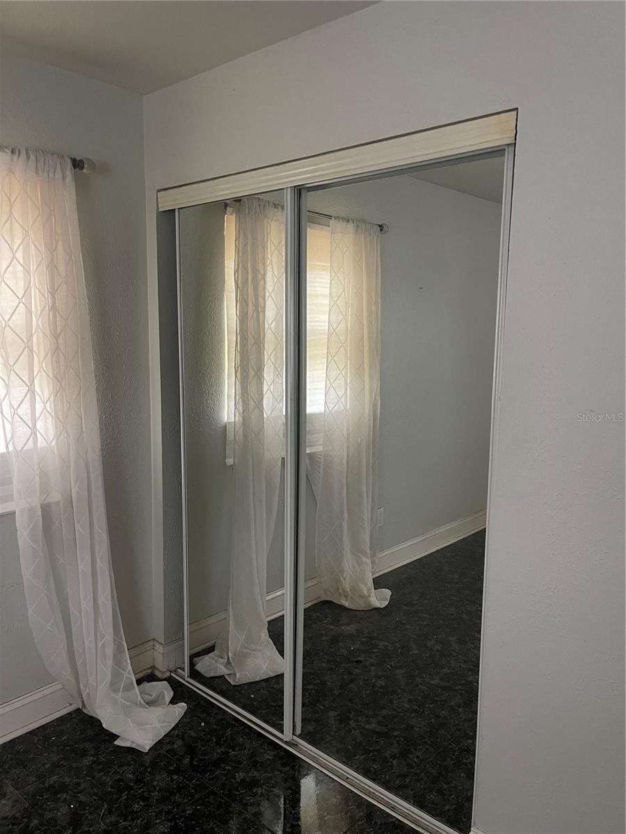 Mirrored closet doors in bedrooms